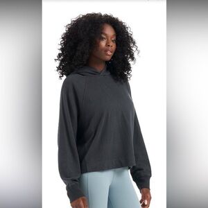 Vuori women’s charcoal grey sunny side hoodie with signature logo patch